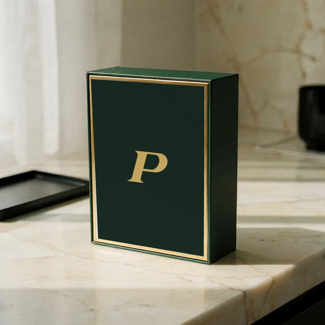 Forest-green Pep Club test kit box on a clean linen surface